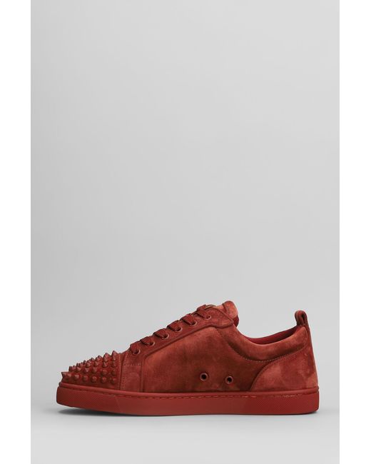 Sneakers Louis junior spikes in Camoscio Rosso di Christian Louboutin in Red da Uomo