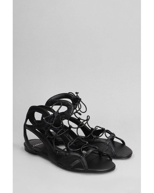 Carrano White Flats In Black Leather