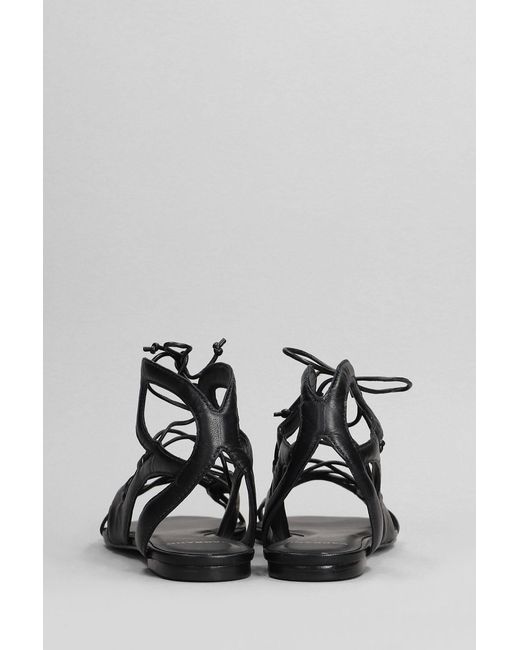 Carrano White Flats In Black Leather