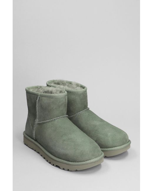 Ugg Classic Mini Ii Low Heels Ankle Boots In Green Suede