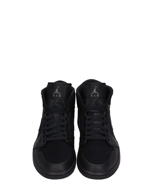 black leather jordan boots