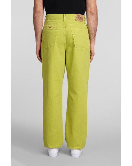 Jeans in denim Verde di Stussy in Yellow da Uomo