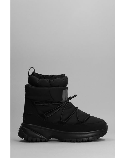 UGG Yose Puffer Mid Low Heels Ankle Boots In Synthetic Fibers in Black ...
