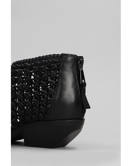 Tronchetti texani in Pelle Nera di Elena Iachi in Gray