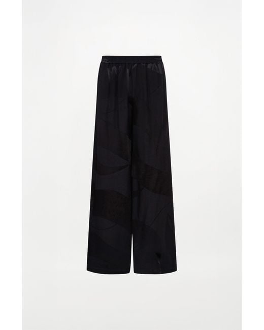 delos.land Black Clement Trousers Monogram for men