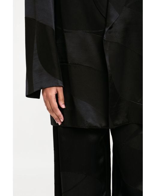 delos.land Black Clement Trousers Monogram