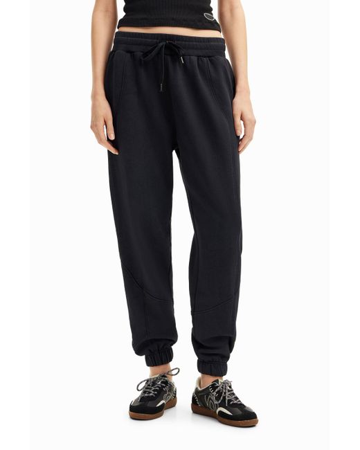 Pantalón Jogger Costuras Desigual de color Black