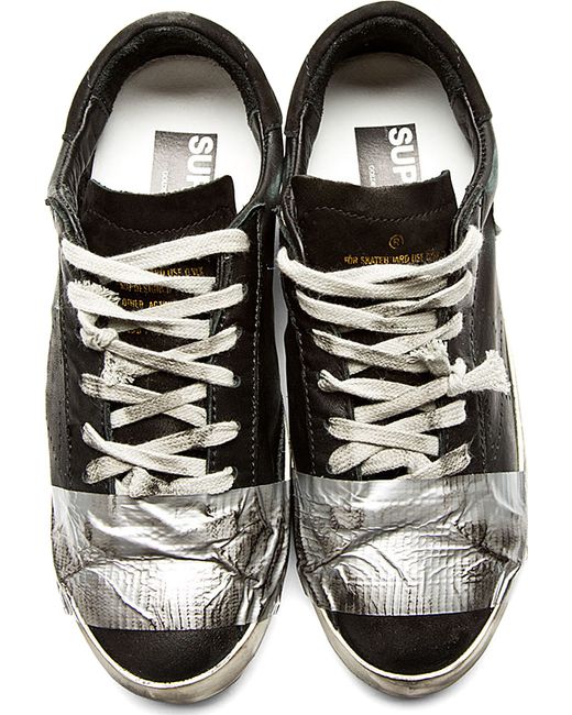 Golden goose hotsell tape sneakers