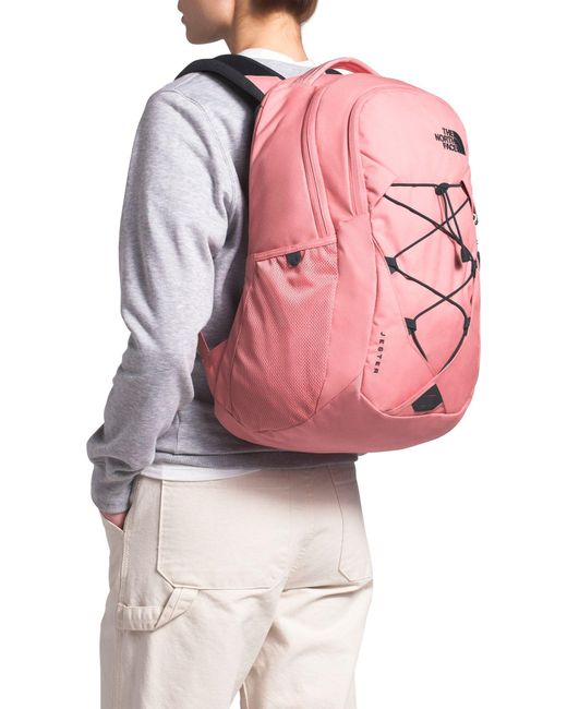 light pink north face bookbag