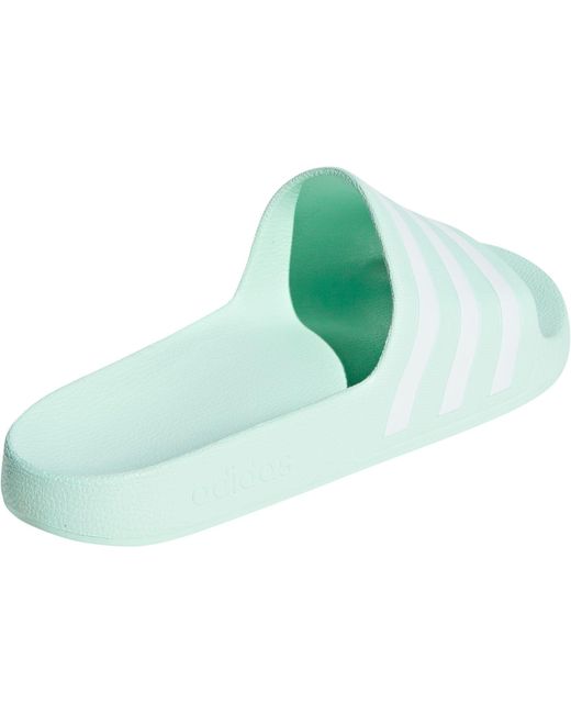 mint green adidas slides