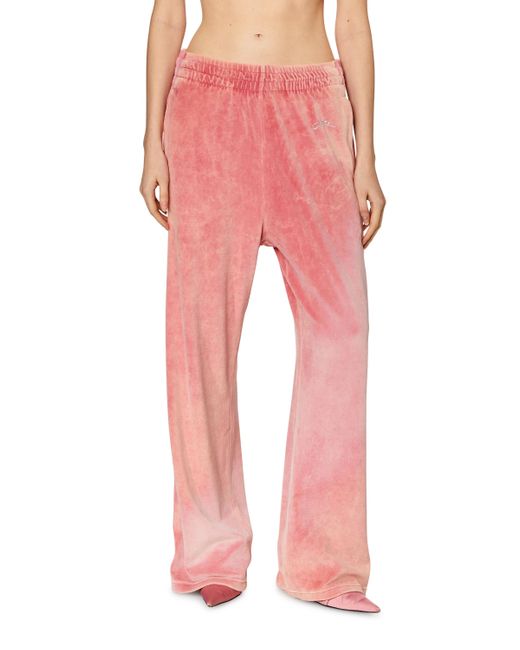 Pantaloni tuta wide-leg in ciniglia con acid wash di DIESEL in Pink