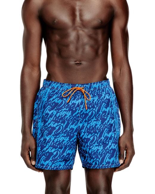 DIESEL Blue Swim Shorts With All-Over Logo Print for men