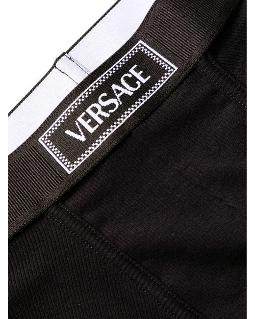 Boxer con banda logo di Versace in Black da Uomo