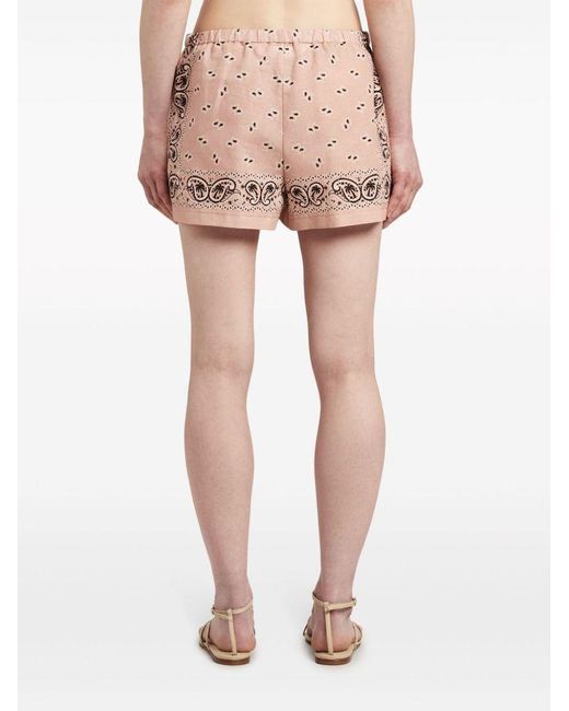 Shorts sportivi con stampa paisley di Palm Angels in Natural