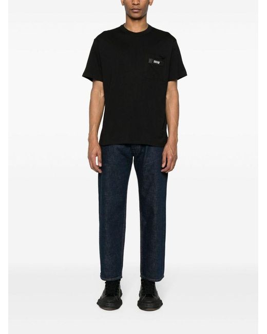 | T-shirt con tasca | male | NERO | XL di Versace in Black da Uomo