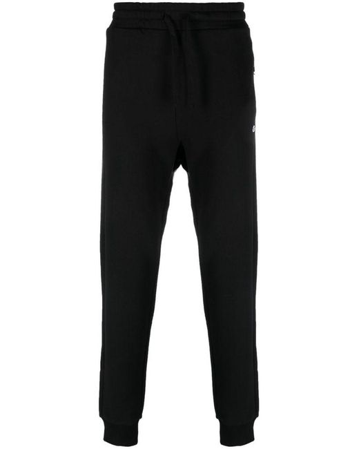 Pantaloni sportivi affusolati con applicazione logo di DIESEL in Black da Uomo