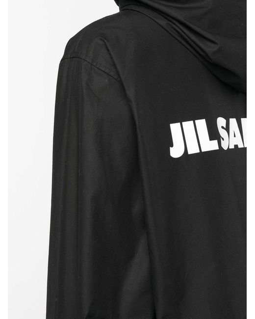Parka con stampa logo e cappuccio di Jil Sander in Black da Uomo