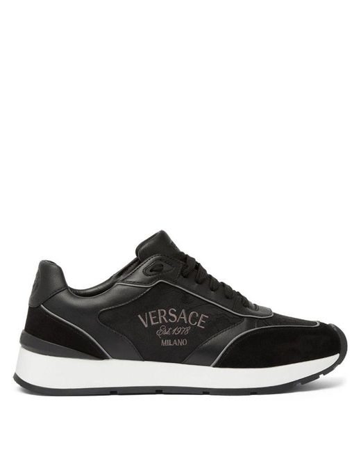 | Sneakers con logo | male | NERO | 44 di Versace in Black da Uomo