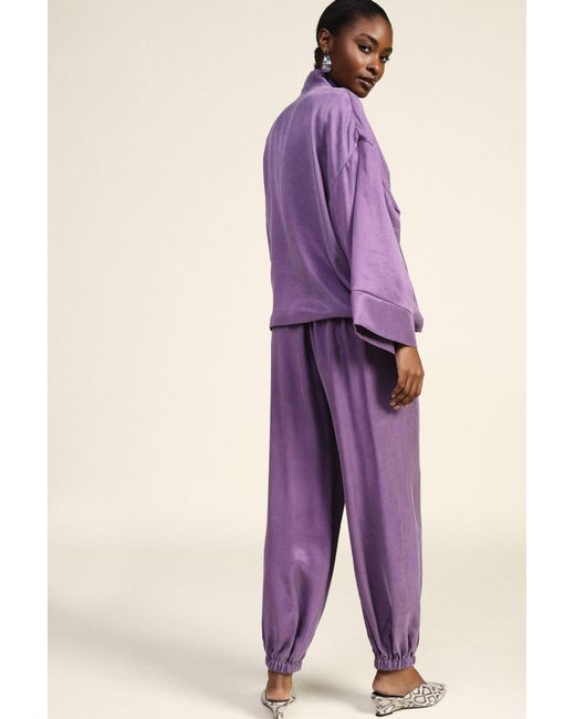 Pantalon Jogging Ample À Poignets Élastiqués Dixie en coloris Purple