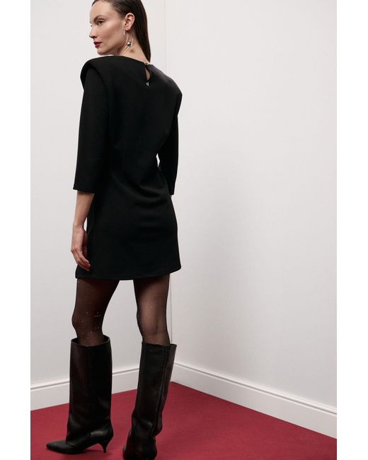 Robe Courte Épaules Structurées Pli Côté Dixie en coloris Black