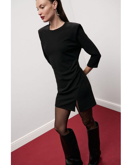 Robe Courte Épaules Structurées Pli Côté Dixie en coloris Black