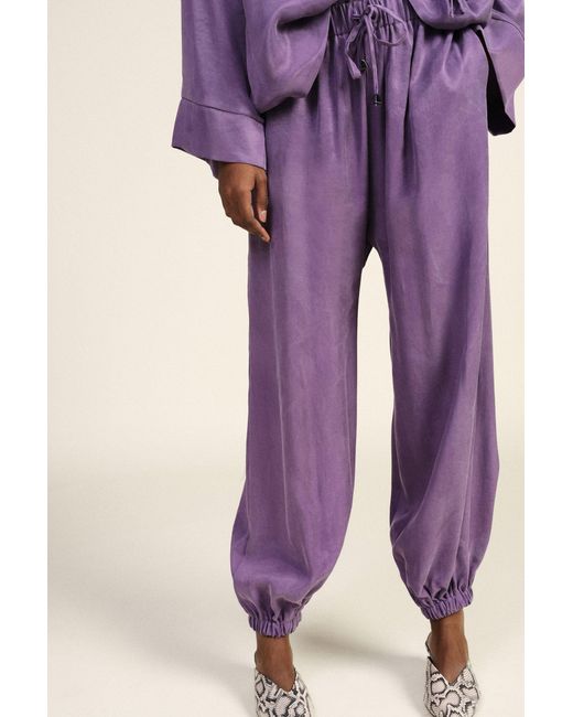 Pantalon Jogging Ample À Poignets Élastiqués Dixie en coloris Purple