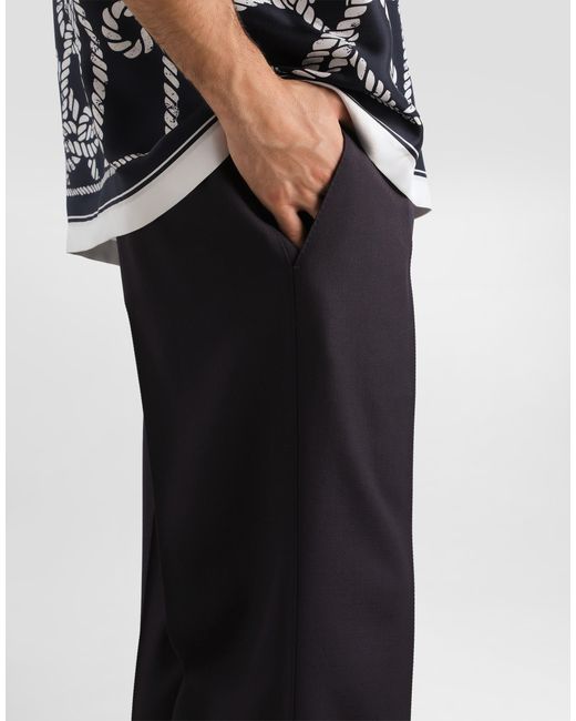 Dolce & Gabbana Blue Virgin Wool Trousers for men