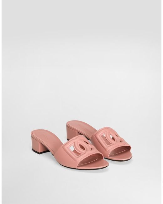【SALE】CALFSKIN MULES WITH DG LOGO Dolce & Gabbana Calfskin Mules With Dg Logo in Pink | Lyst