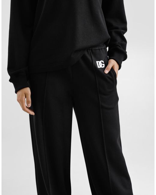 Dolce & Gabbana Black Flared Jersey Jogging Pants With Dg Logo Embroidery