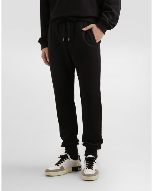 Dolce & Gabbana Black Jersey Trousers With Patch for men