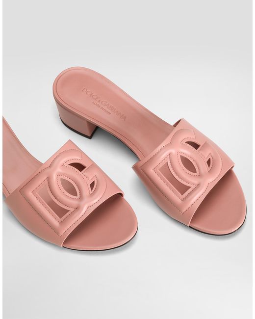 【SALE】CALFSKIN MULES WITH DG LOGO Dolce & Gabbana Calfskin Mules With Dg Logo in Pink | Lyst