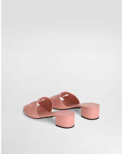 【SALE】CALFSKIN MULES WITH DG LOGO Dolce & Gabbana Calfskin Mules With Dg Logo in Pink | Lyst