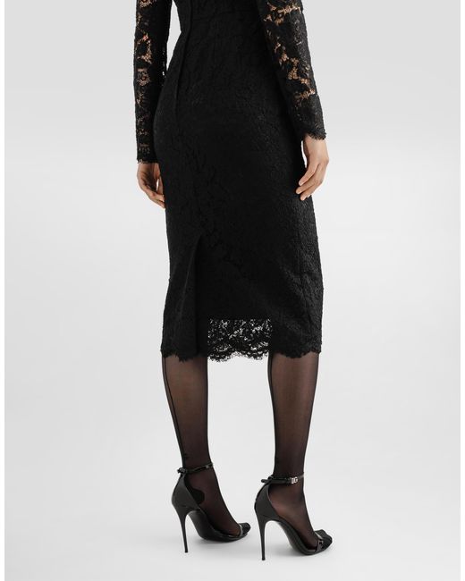 Vestido Longuette De Manga Larga En Encaje Elástico Con Logotipo Dolce & Gabbana de color Black