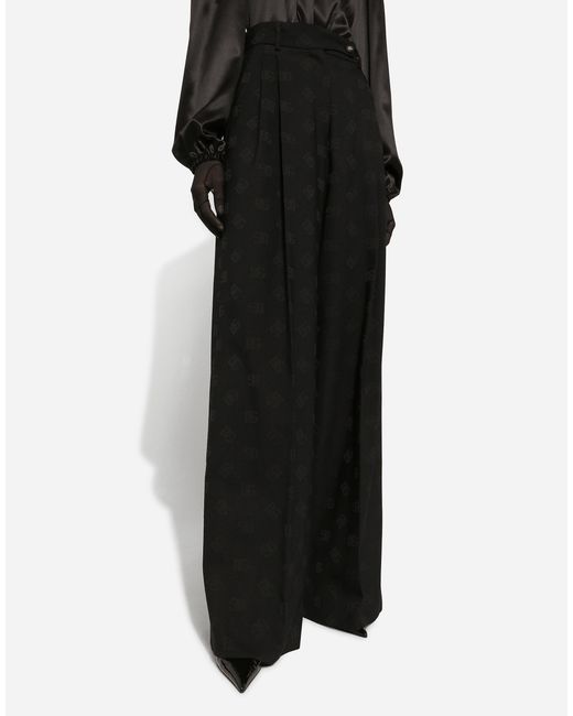 Dolce & Gabbana Black Flared Wool Jacquard Pants With Dg Logo