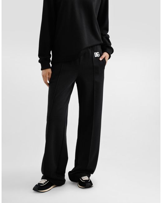 Dolce & Gabbana Black Flared Jersey Jogging Pants With Dg Logo Embroidery