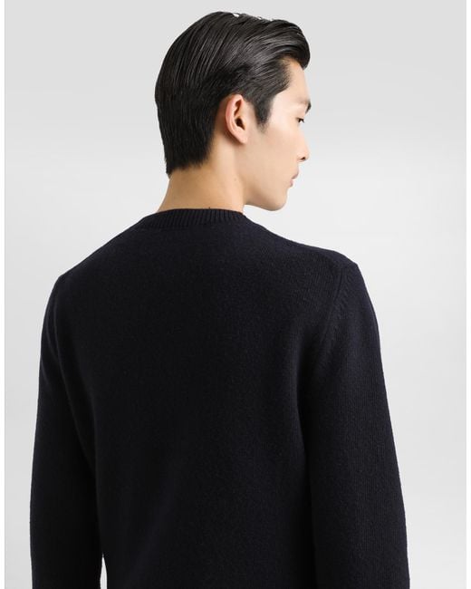 Dolce & Gabbana Blue Wool Round-Neck Sweater With Bejeweled Buttons for men