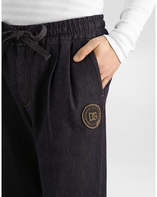 Dolce & Gabbana Blue Denim Joggers With Patch for men
