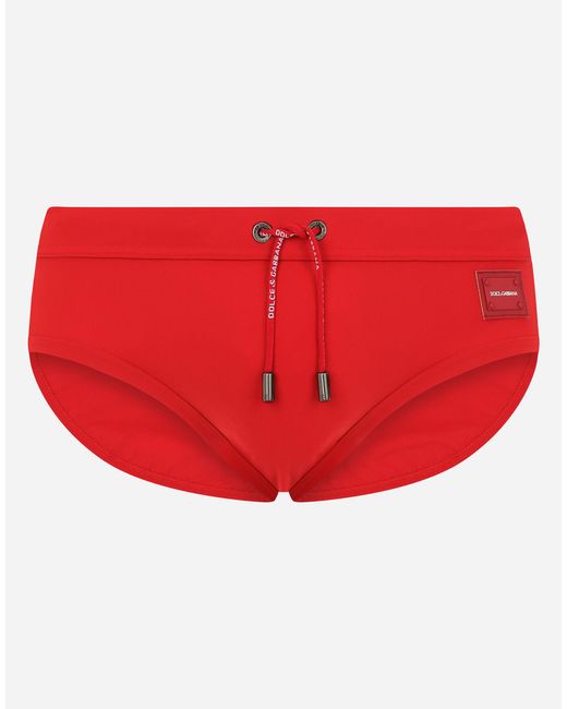 Dolce & Gabbana Swim Briefs With Highcut Leg And Branded Plate in Red