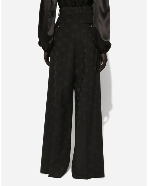 Dolce & Gabbana Black Flared Wool Jacquard Pants With Dg Logo