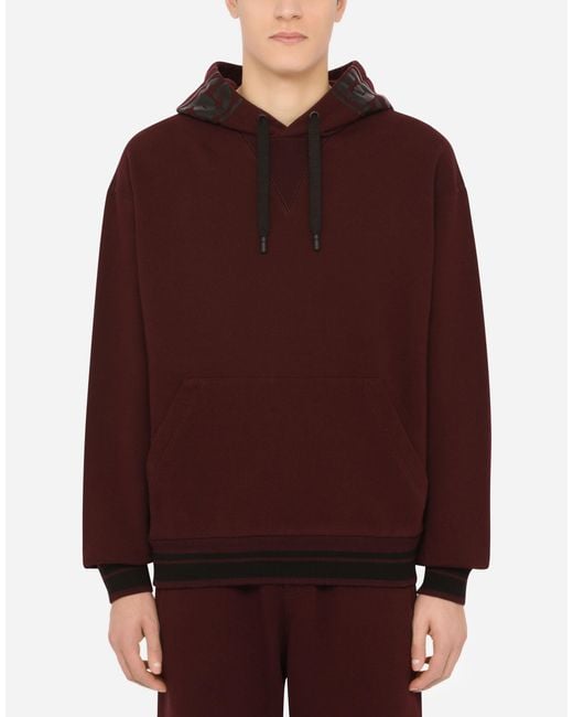 Dolce & Gabbana JerseySweatshirt mit Kapuze und DGLogostreifen in Rot