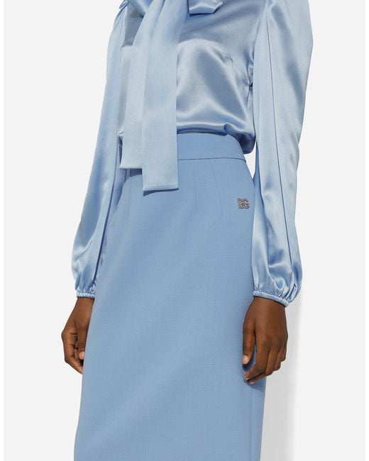 スカート Dolce&Gabbana WOOL CREPE CALF-LENGTH PENCIL SKIRT Wool calf-length pencil skirt in Black for Women