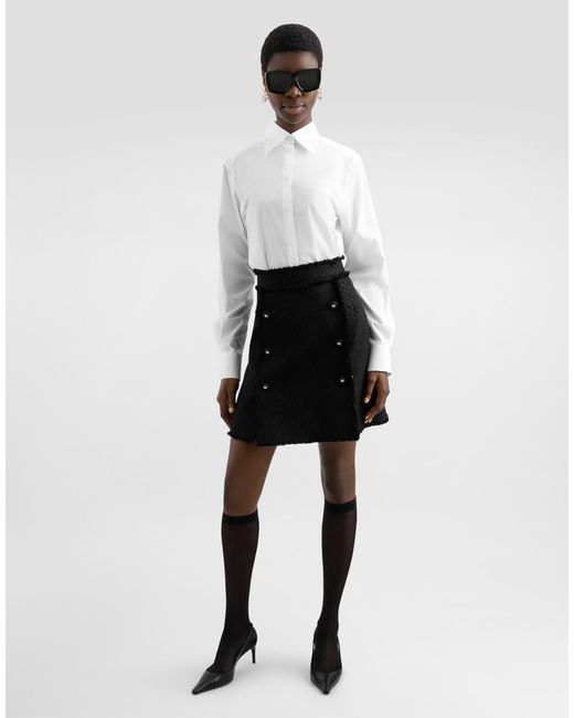 Dolce & Gabbana Black Kurzer Rock Aus Raschel-Tweed Mit Dekorativen Knöpfen Mit Dg-Logo