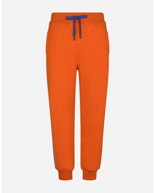 Dolce & Gabbana Jogging Pants With Branded Side Bands in Orange for Men ...