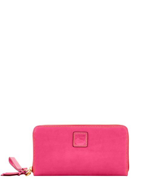 Dooney & Bourke Leather Florentine Large Zip Around Wristlet in Fuchsia ...