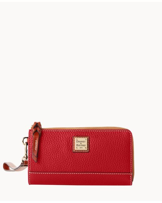 Dooney & Bourke Pebble Grain Folded Zip Wristlet in Red Lyst