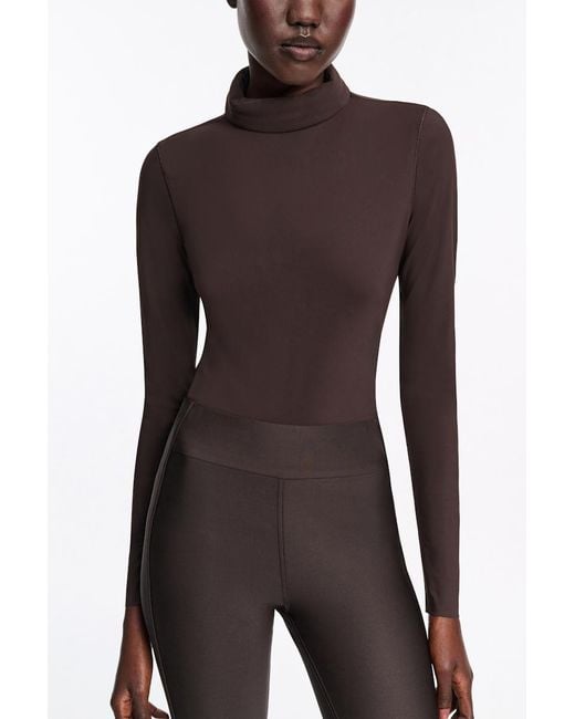 Dorothee Schumacher Black Longsleeve mit Rollkragen aus leichtem, technischem Jersey