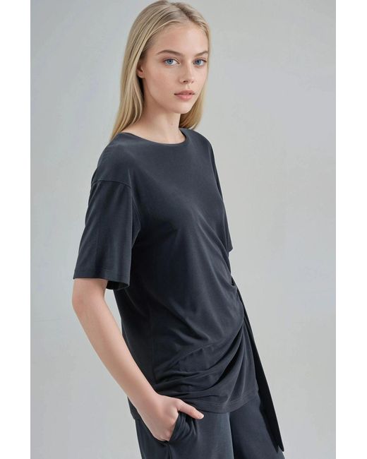 Busem Blue Loose Fit Crew Neck Modal Blouse With Tie Detail