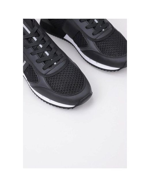 ea7 trainers black and gold