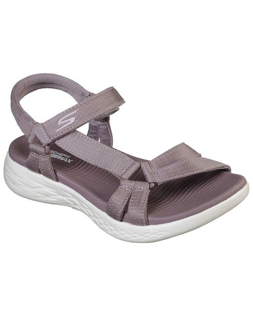 purple skechers sandals