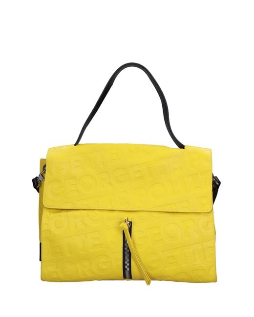 Bolsas. Amarillo Rebelle de color Yellow